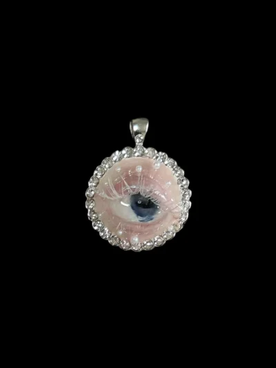 Handcrafted realistic deep blue eyeball necklace pendant with rhinestones and pearls, Weirdcore and Whimsigoth macabre art jewelry.