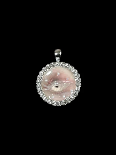 Handcrafted pale white ghostly eyeball necklace pendant with rhinestones and scattered pearls, Whimsigoth and Dark Academia macabre art jewelry.